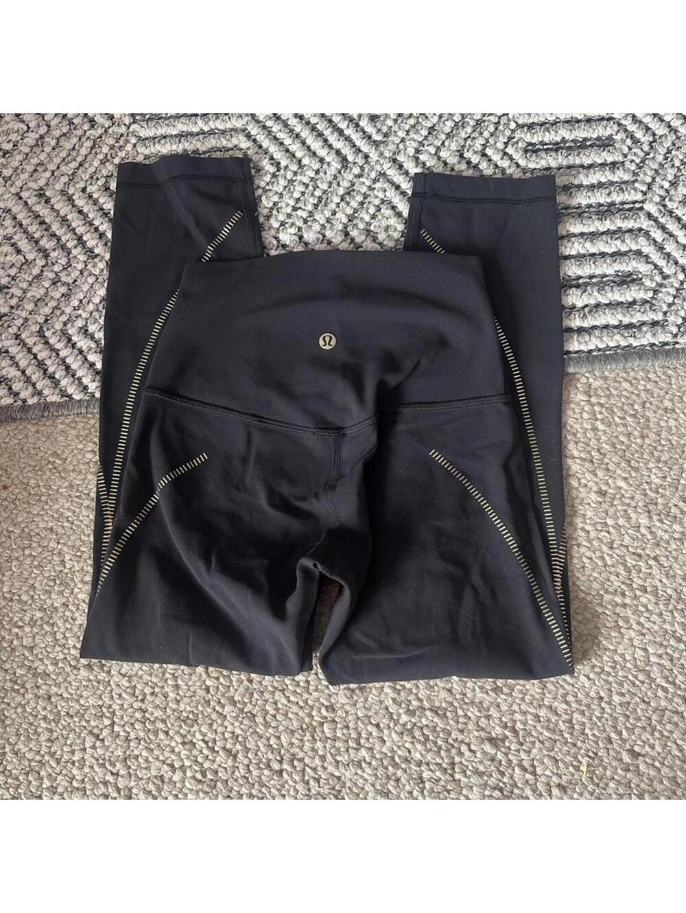 Lululemon black align leggings with gold stitching